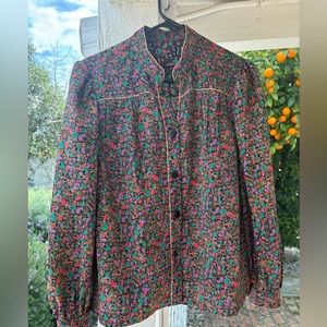 Cute floral top vintage nice to dress up or with a pair of jeans cute anytime